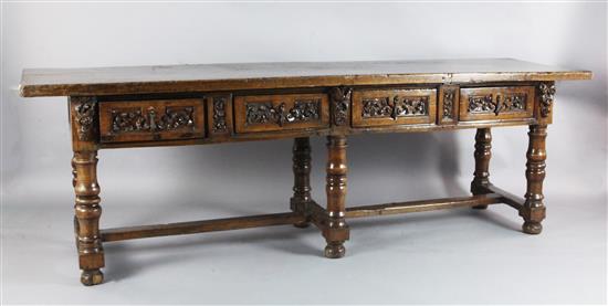 A mid 17th century Italian walnut table, L.8ft 7.5in.